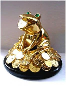 Лягушка на деньгах -  символ достатка