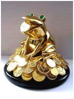 Лягушка на деньгах -  символ достатка