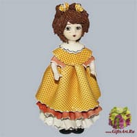 Статуэтка &quot;Кукла с темными  волосами в оранжевом  платье&quot;