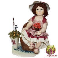 Статуэтка &quot;Кукла с цветами сидящая на кресле&quot;