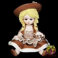 Статуэтка &quot;Кукла сидящая с цветами&quot;