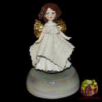 Статуэтка-музыкальная &quot;Ангел с коричневыми волосами&quot;
