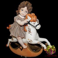 Кукла Девочка сидящая на лошадке-качалке Sibania Италия