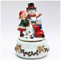 Дети лепят снеговика. Музыкальная фарфоровая фигурка. Высота 17 см
