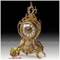 Каминные часы бронзовые с завитком золотистые. Высота 33 см. Испания