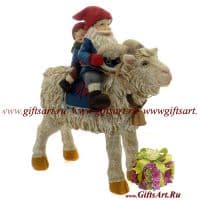 Санта на козле с юным новым годом. Статуэтка. Длина 22 см Санта на козле с юным новым годом. Статуэтка. Длина 22 см