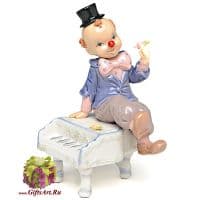 Клоун на рояле фарфоровая статуэтка. Высота 15 см Клоун на рояле фарфоровая статуэтка. Высота 15 см